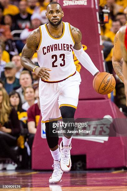 LeBron James of the Cleveland Cavaliers drives down the court during the first half of the NBA Eastern Conference semifinals against the Atlanta...