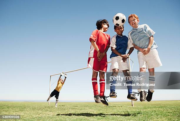 soccer players blocking a penalty kick - abwehr stock-fotos und bilder