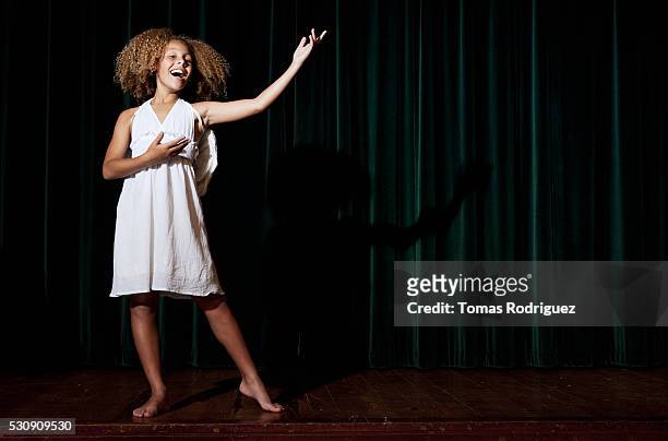 girl singing on stage - actor stock pictures, royalty-free photos & images