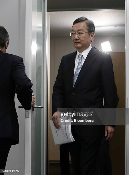 Kozo Takahashi, president of Sharp Corp., arrives for a news conference in Tokyo, Japan, on Thursday, May 12, 2016. Sharp posted a second straight...