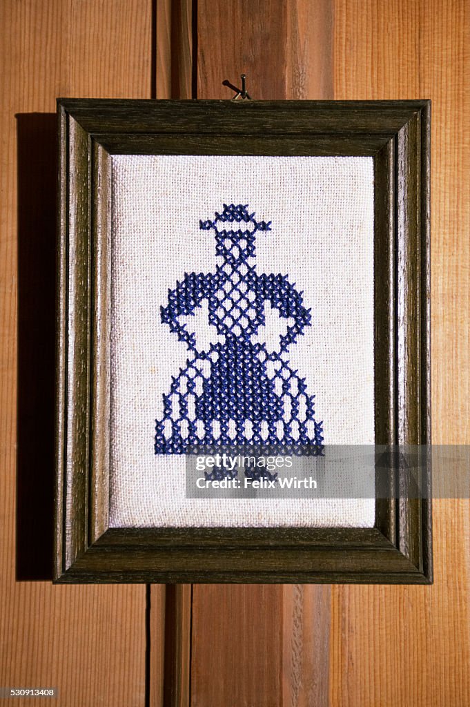 Cross-stitch of woman