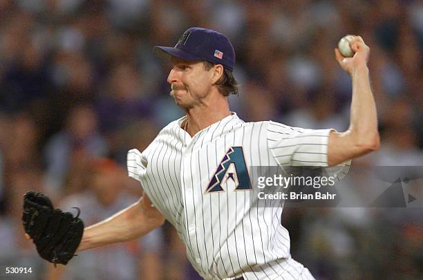 Starting pitcher Randy Johnson of the Arizona Diamondbacks throws against the Atlanta Braves during the second inning of the National League...