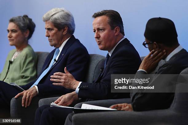 British Prime Minister Cameron is joined by Sarah Chayes, a senior associate in the Democracy and Rule of Law Program, US Secretary of State John...