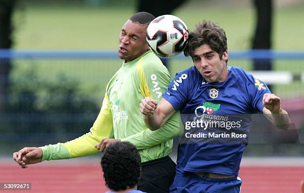 Goalie Dida of Brazil attacks Juninho Pernambucano of Brazil during the Brazilian National Team training session for the Confederations Cup 2005 on...