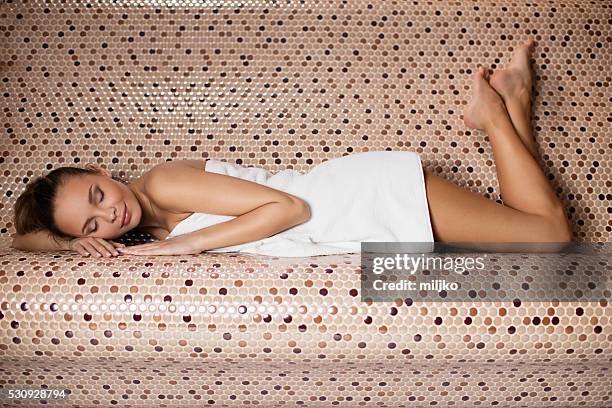 beautiful girl enjoying in the steam bathroom or sauna - turkish bath stock pictures, royalty-free photos & images