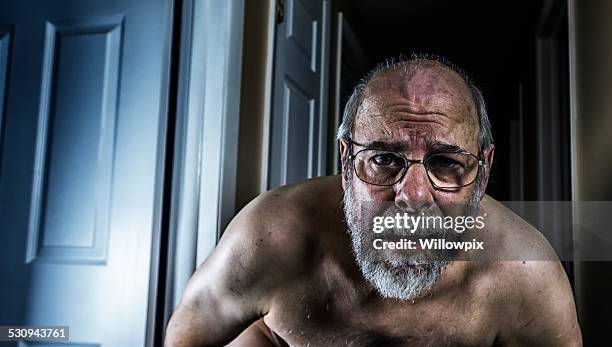 creepy senior man staring at camera - hairy chest man stock pictures, royalty-free photos & images