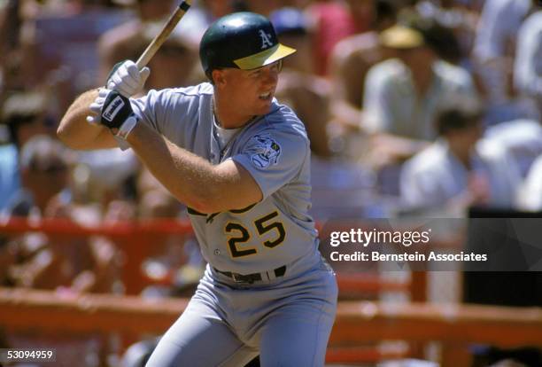 Mark McGwire of the Oakland Athletics stands ready at bat during a 1988 season game. Mark McGwire played for the Oakland Athletics from 1986-1997.