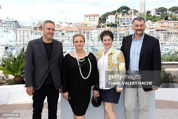 Romanian director Cristi Puiu poses on May 12, 2016 with Romanian actor Mimi Branescu , Romanian actress Dana Dogaru and Romanian producer Anca Puiu...