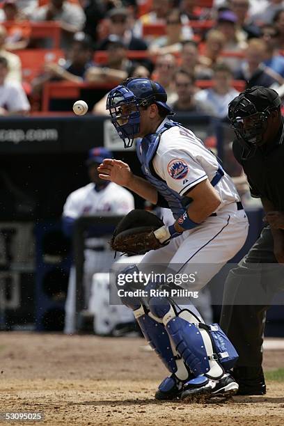 Mike Piazza of the New York Mets fields during the game against the New York Yankees at Shea Stadium on May 21, 2005 in Flushing, New York. The Mets...