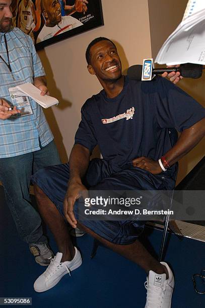 Antonio McDyess of the Detroit Pistons smiles as he answers questions from the press during Media Availability the day after Game Four of the 2005...
