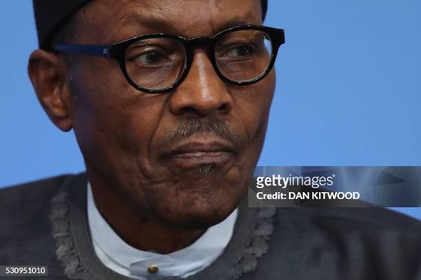 Nigerian President Muhammadu Buhari listens during a panel discussion during the Anti-Corruption Summit London 2016, at Lancaster House in central...