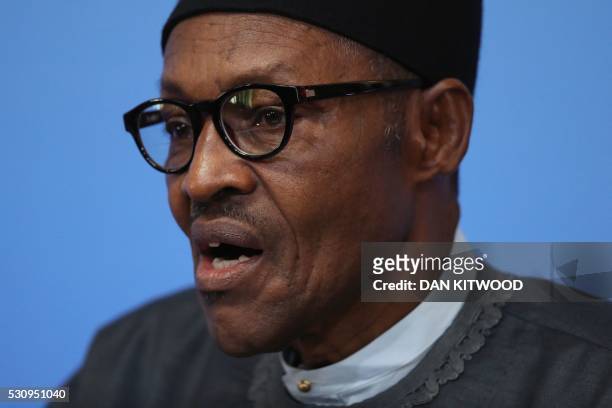 Nigerian President Muhammadu Buhari listens during a panel discussion during the Anti-Corruption Summit London 2016, at Lancaster House in central...