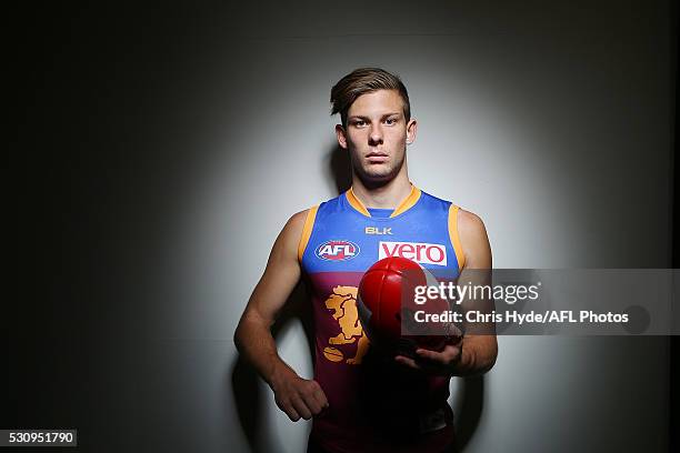 Josh Clayton poses during a Brisbane Lions AFL portrait shoot at The Gabba on May 12, 2016 in Brisbane, Australia.