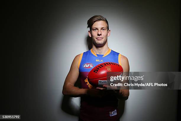 Josh Clayton poses during a Brisbane Lions AFL portrait shoot at The Gabba on May 12, 2016 in Brisbane, Australia.