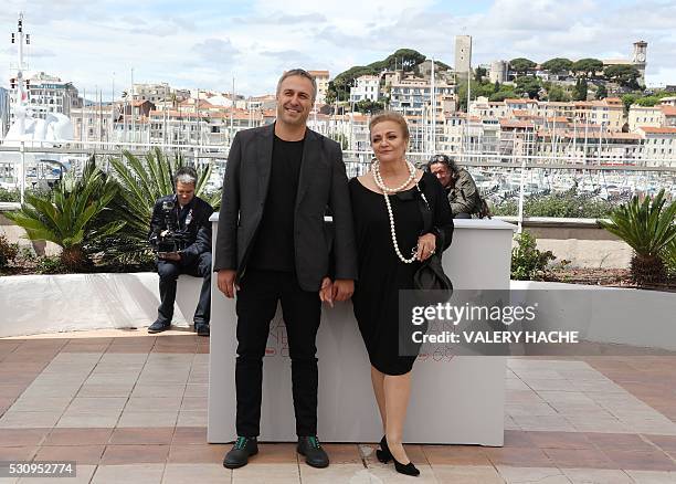 Romanian actors Mimi Branescu and Dana Dogaru pose on May 12, 2016 during a photocall for the film "Sieranevada" at the 69th Cannes Film Festival in...