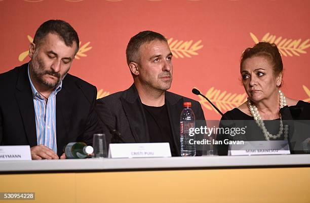 Director Cristi Puiu, actor Mimi Branescu and actress Dana Dogaru attend the "Sieranevada" press conference during the 69th annual Cannes Film...