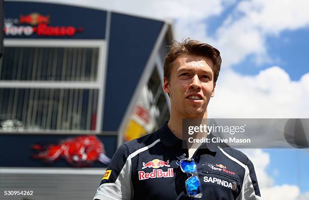 Daniil Kvyat of Russia and Scuderia Toro Rosso walks in the Paddock during previews to the Spanish Formula One Grand Prix at Circuit de Catalunya on...