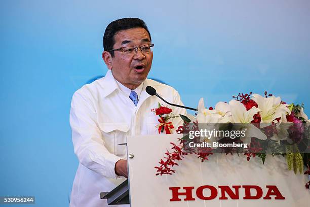 Takahiro Hachigo, president and chief executive officer of Honda Motor Co., speaks during the opening ceremony of the company's new assembly plant in...