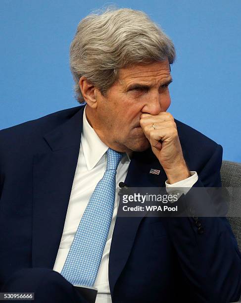 Secretary of State John Kerry listens during a panel discussion at the international anti-corruption summit on May 12, 2016 in London, England....