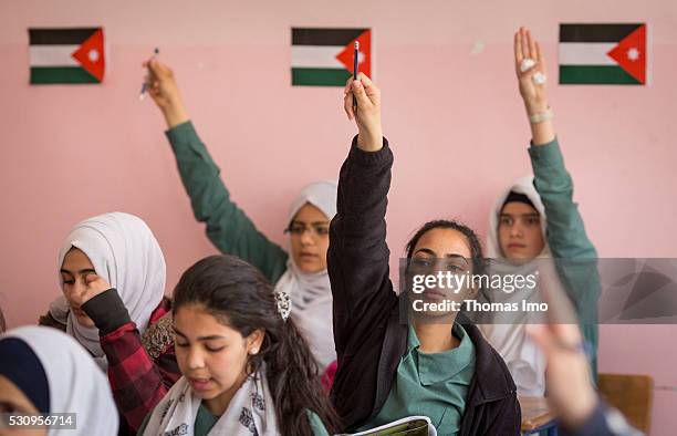 Amman, Jordan Teaching at the school bilayer Al Quds , Amman. There Jordanian and Syrian children are taught in separate layers on April 03, 2016 in...