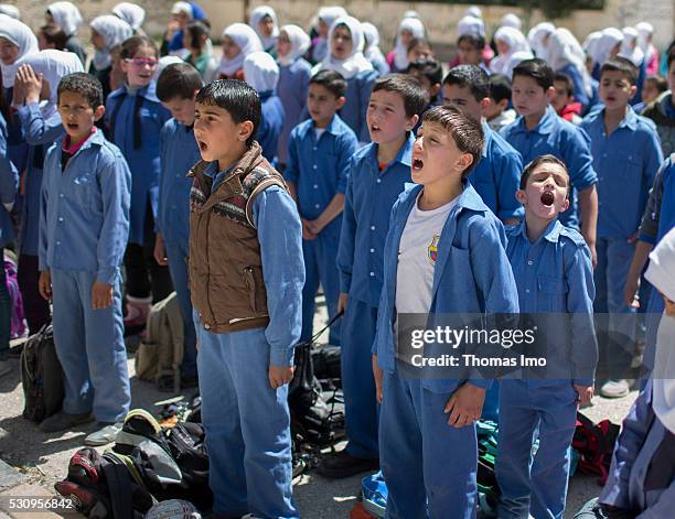 Amman, Jordan Teaching at the school bilayer Al Quds , Amman. There Jordanian and Syrian children are taught in separate layers on April 03, 2016 in...