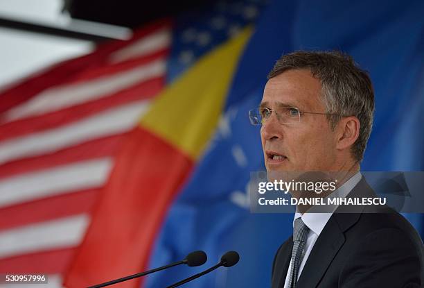 Secretary General Jens Stoltenberg delivers a speech during the inauguration ceremony of the Aegis Ashore Romania facility at the Deveselu military...