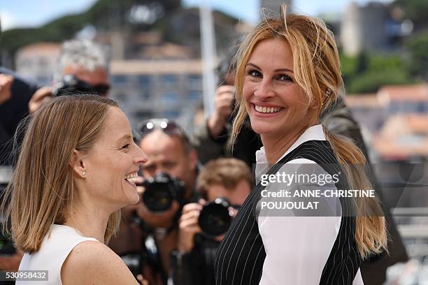 Actress Julia Roberts and US director Jodie Foster pose on May 12, 2016 during a photocall for the film "Money Monster" at the 69th Cannes Film...