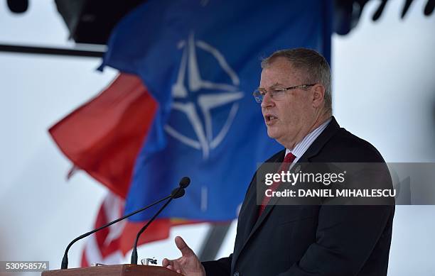 Deputy Secretary of Defense Robert O Work gives a speech during the inauguration ceremony of the Aegis Ashore Romania facility at the Deveselu...