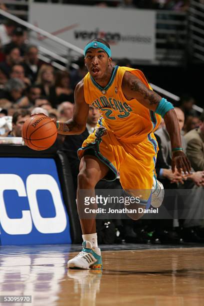 Smith of the New Orleans Hornets drives against of the Chicago Bulls during the game on March 18, 2005 at the United Center in Chicago, Illinois. The...