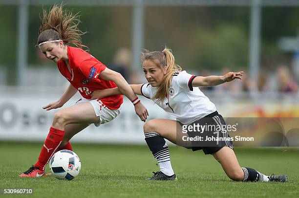 Gina Chmielinski of Germany fights for the ball with Claudia Wenger of Austria during the U16 girl's international friendly between U16 girl's...