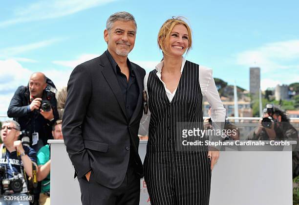 Actors Julia Roberts and George Clooney attend the "Money Monster" photocall during the 69th annual Cannes Film Festival at the Palais des Festivals...