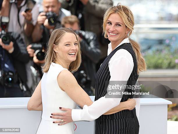 Julia Roberts and Jodie Foster attend the 'Money Monster' photocall during the 69th annual Cannes Film Festival at the Palais des Festivals on May...