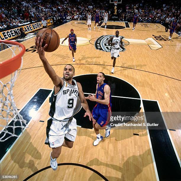 Tony Parker of the San Antonio Spurs goes for a layup against Tayshaun Prince of the Detroit Pistons in Game Two of the 2005 NBA Finals on June 12,...