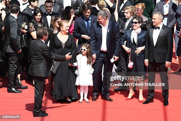 Romanian director Cristi Puiu arrives on May 12, 2016 with Romanian actress Dana Dogaru, Romanian actress Zoe Puiu, Romanian producer Anca Puiu and...