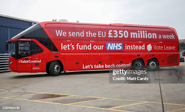 Journalists wait for the arrival of Boris Johnson and the Vote Leave bus as he visits Reidsteel, a Christchurch company backing the Leave Vote on the...