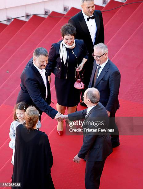 Actor Mimi Branescu, producer Anca Puiu, director Cristi Puiu and actor Dana Dogaru are welcomed by President of the Cannes Film Festival Pierre...