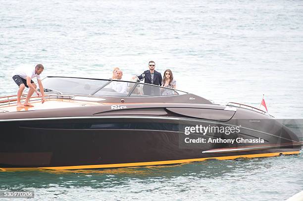 Anna Kendrick and Justin Timberlake are seen getting out of a boat to the 'Trolls' Photocall during the 69th Annual Cannes Film Festival on May 11,...