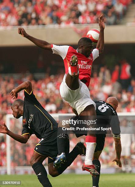 Koto Toure of Arsenal in action against Damien Francis and Gavin Mahon of Watford in a Barclays Premier League match at the Emirates Stadium, London,...