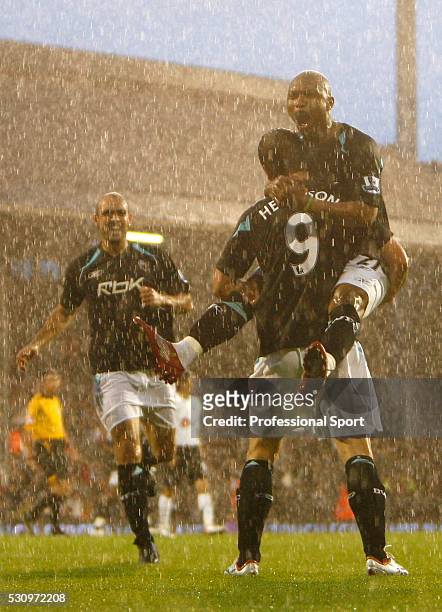 Heidar Helguson celebrates his goal with El Hadji Diouf of Bolton Wanderers during the Fulham v Bolton Wanderers Premiership Match at Craven Cottage...