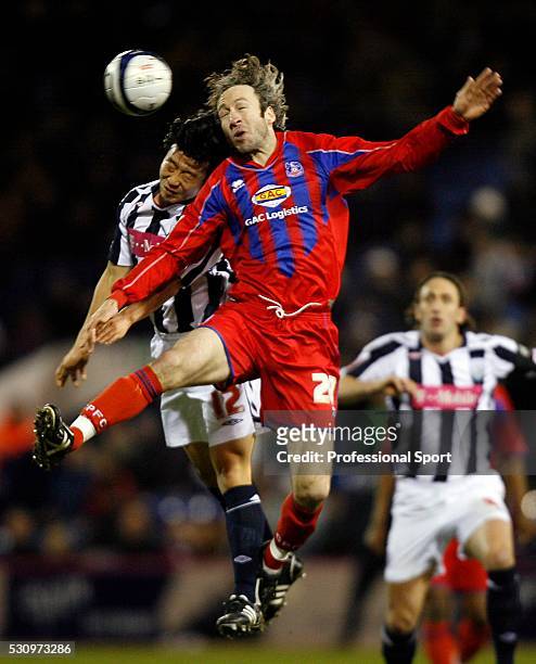 Sean Derry of Crystal Palace and Do-Heon Kim of West Brom in action during the West Bromwich v Crystal Palace Championship Match at The Hawthorns...