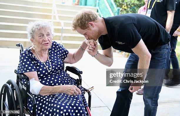 Prince Harry meets 95 year old Ruth Uffleman at the wheelchair tennis on the final day of the Invictus Games Orlando 2016 at ESPN Wide World of...