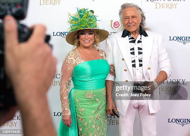 Musician Tanya Tucker and executive Peter Nygard attends the 142nd Kentucky Derby at Churchill Downs on May 07, 2016 in Louisville, Kentucky.