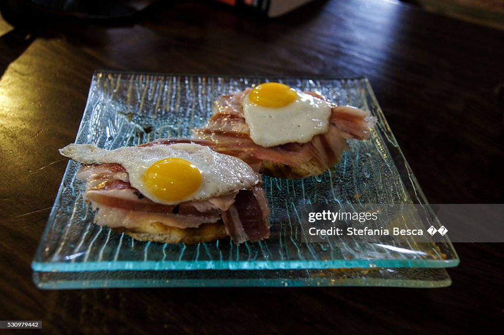 Tapas with bacon and quail eggs