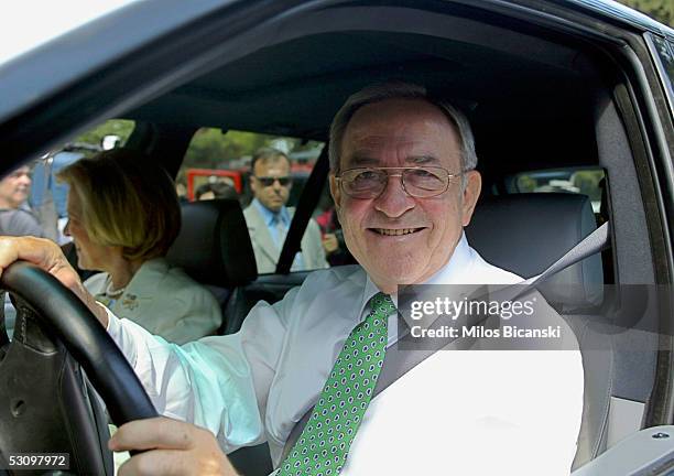 Constantine, former King of Greece, attends the christening service of Odysseas-Kimon, his youngest grandson at the Agios Ioannis monastery of Kareas...