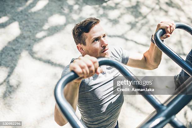 power up! - chin ups stock pictures, royalty-free photos & images