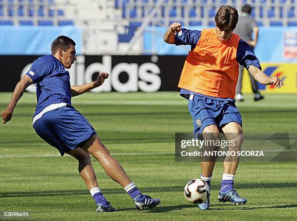 Brazil's national football team players Lucio and Juninho Pernambucano are seen during a training session on 18 June 2005 in Hanover, western...
