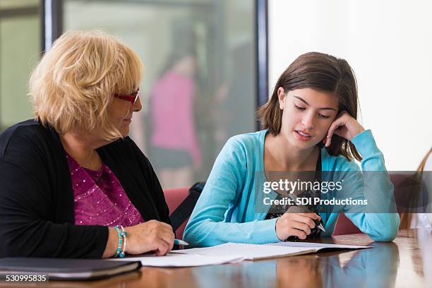 junior high school student taking placement test with teacher - ssc exam stock pictures, royalty-free photos & images