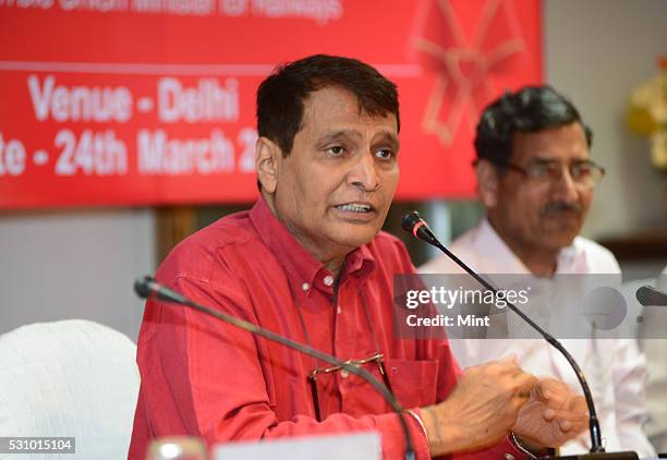 Union Minister for Railways Suresh Prabhakar Prabhu at a launch of prepaid card, called RuPay Pre-paid card, at Rail Bhavan on March 25, 2015 in New...