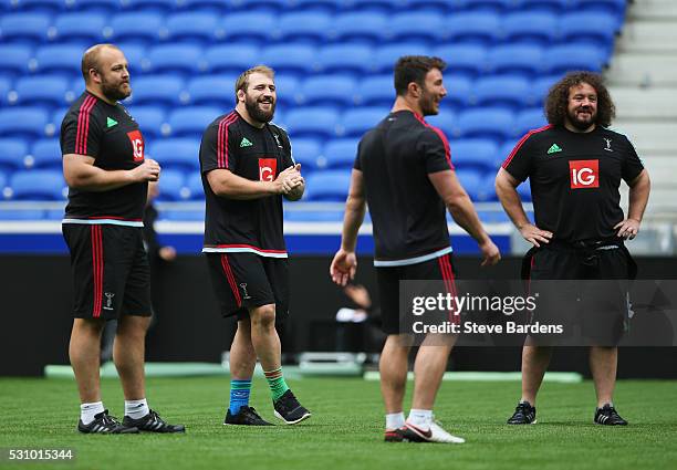 Mark Lambert, Joe Marler, George Lowe and Adam Jones look on during the Harlequins Captain's Run on the eve of the European Rugby Challenge Cup Final...