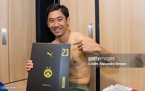 Shinji Kagawa of Borussia Dortmund revealing the new Borussia Dortmund home jersey, Season 2016-2017 on May 12, 2016 in Dortmund, Germany.